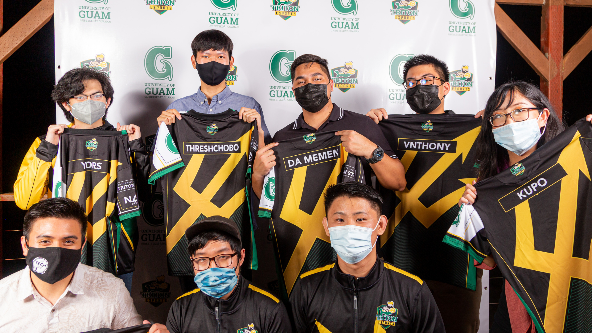 Members of the 2020–2021 League of Legends team pose with their new Triton Esports jerseys at the Triton Esports Appreciation Banquet on Aug. 13 at The Cove Guam. (Back row, from left) Ryoh Sato, Daniel Lee, Damen Borja, Anthony Orallo, (front row, from left) John Taman Jr., Peter Kwon, Jonathan Dunna, and Andrea Quitoriano.