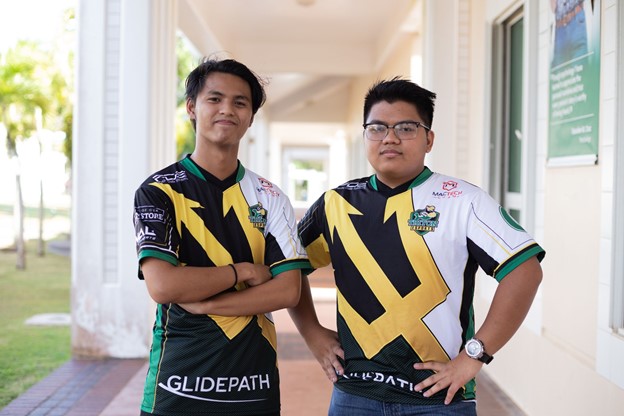 Team captain Barron “Trix” Tranate (left) and Daryl “Technition” Dianzon (right) pose for a celebratory picture following their achievement in the NACE Starleague Community Cup