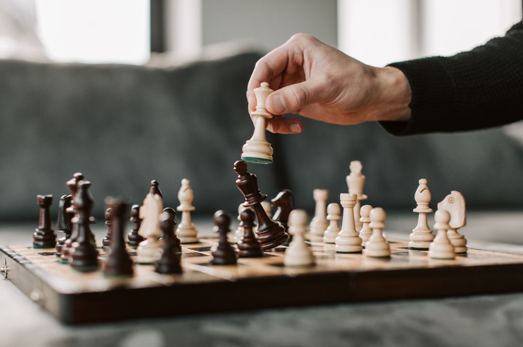 Photo of someone playing chess